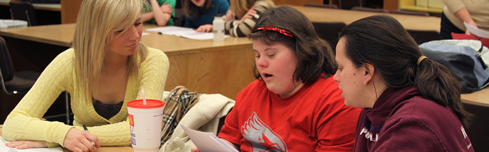 ISU students listening to student reading